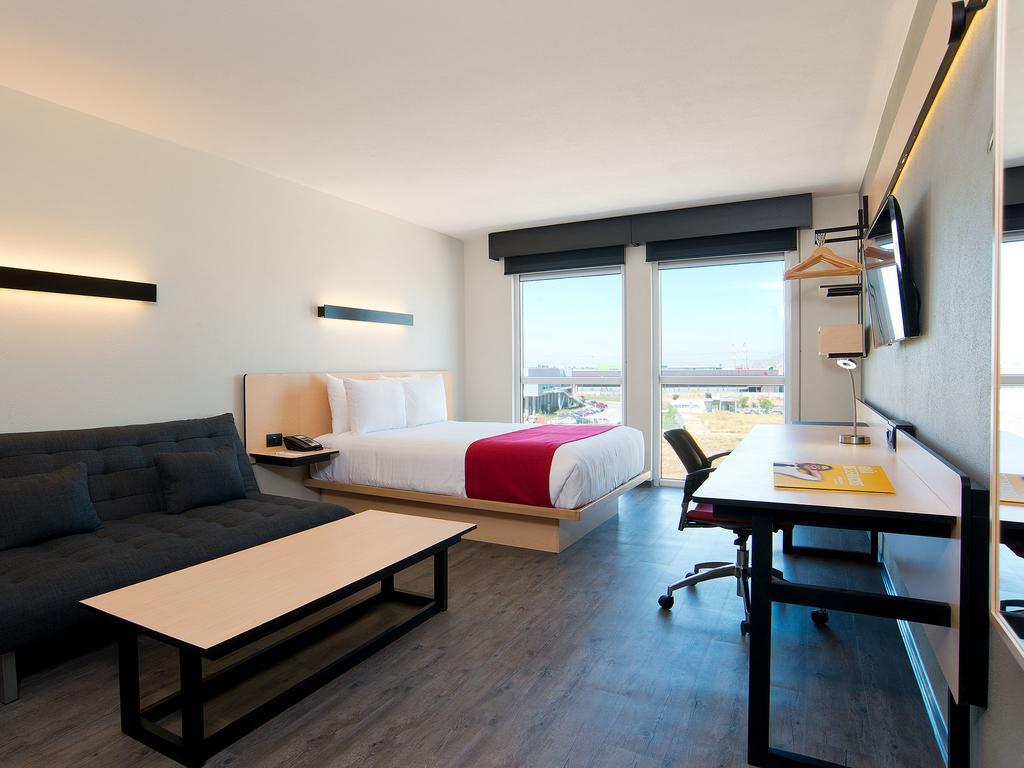 Habitación Doble Superior con sofá cama